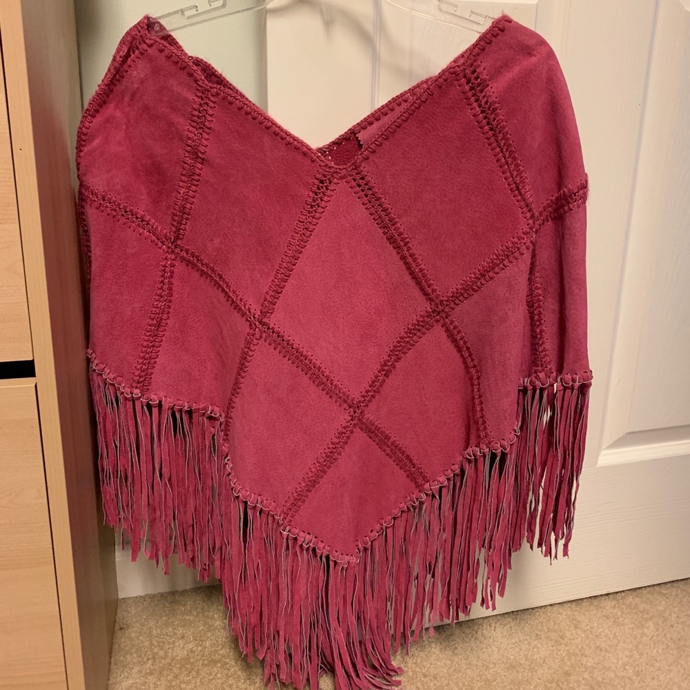 Wilson’s leather fringe poncho